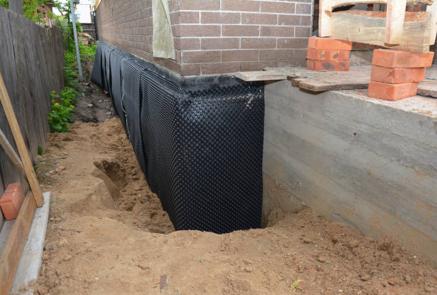 Happy homeowners after waterproofing job in Newnan